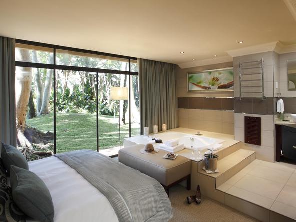 Cascades Hotel - bedroom and garden